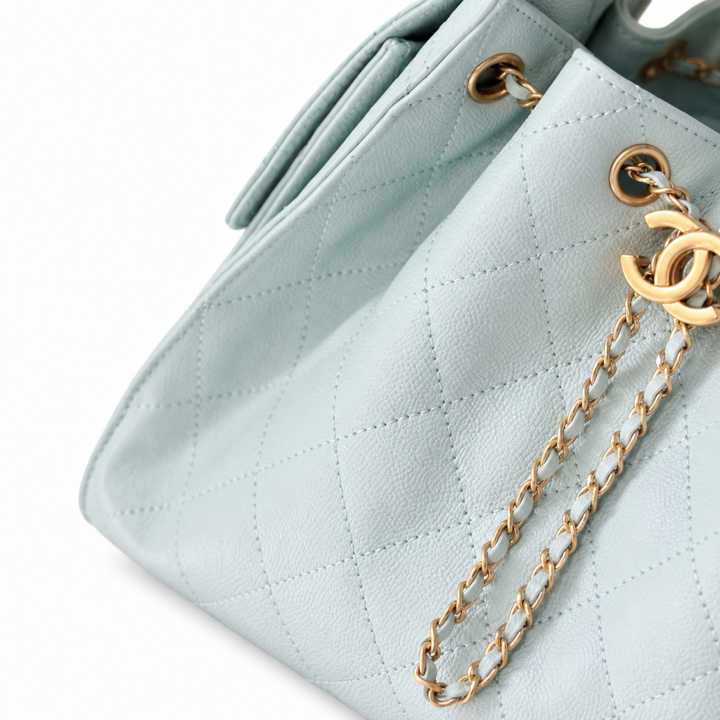 Chanel Quilted Leather Drawstring Backpack Light Blue Gold Hardware