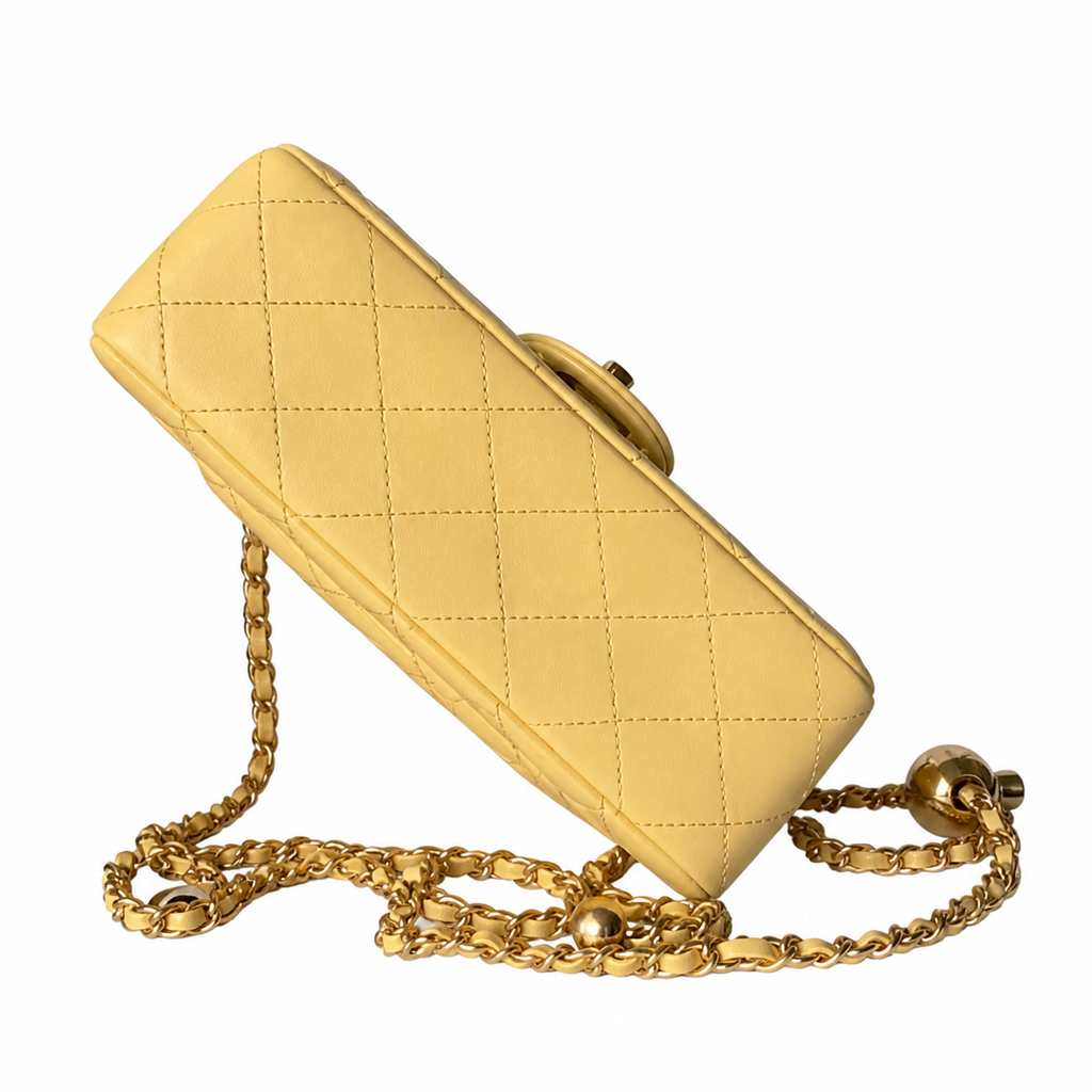 Chanel Pearl Crush Mini Flap Bag Butter Yellow Lambskin Aged Gold CC Turn-Lock Ball Charm Chain 20cm