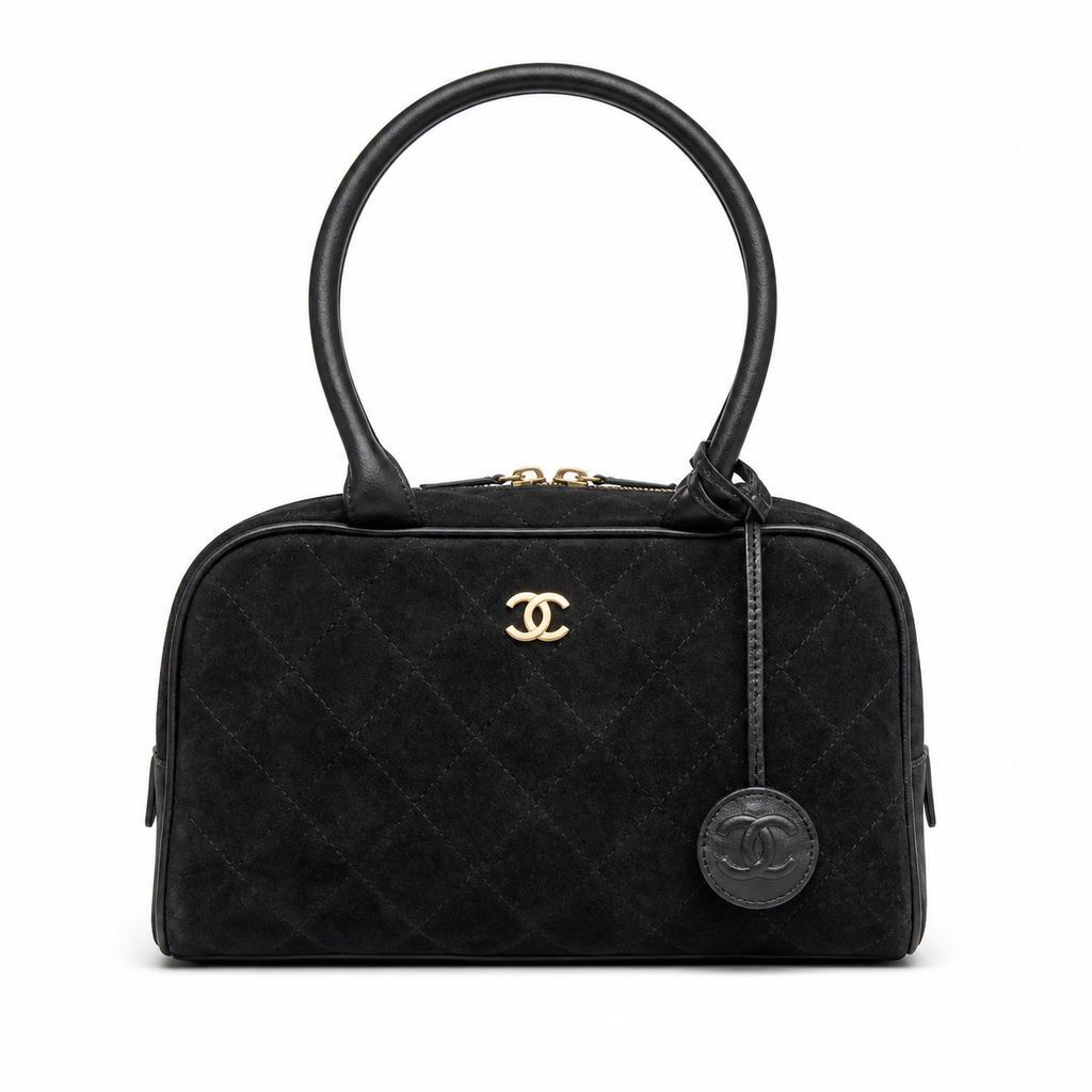 Chanel Bowling Bag Black Diamond-Quilted Suede | Elongated Barrel & Gold Full-Length Zip — 29cm