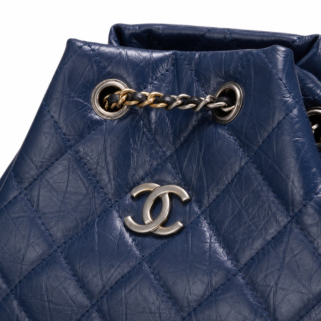 Chanel Gabrielle Backpack Navy Blue Aged Calfskin Black Patent Base Mixed Metal Hardware Drawstring Chain 24cm